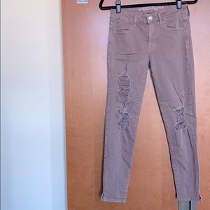 AE Distressed mauve high rise jeggings/ jeans